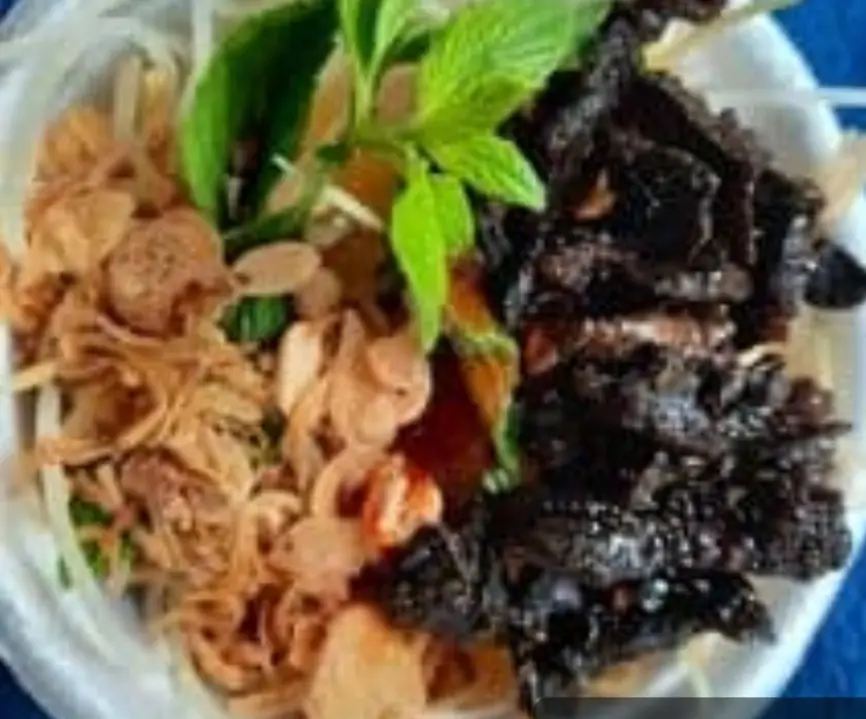 Hình ảnh gỏi đu  đủ khô bò đen