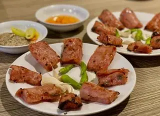 Hình ảnh nem chua nướng