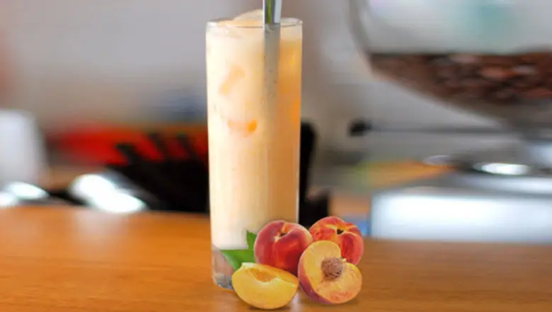 Hình ảnh trà sữa đào dầm sương sáo ly 700ml