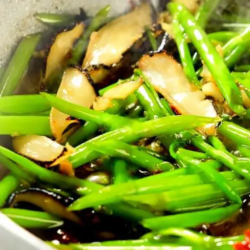 Hình ảnh Ốc giác xào rau muống
