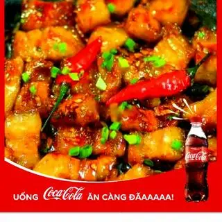 Hình ảnh Cơm thịt rang cháy cạnh kèm Coca cola