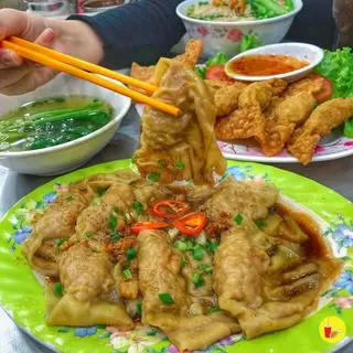 Hình ảnh Sủi Cảo Nhân Tôm Thịt Sốt Dầu Hào