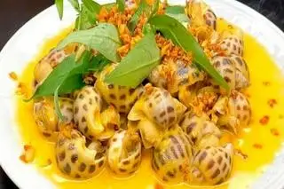 Hình ảnh Ốc hương xào bơ tỏi