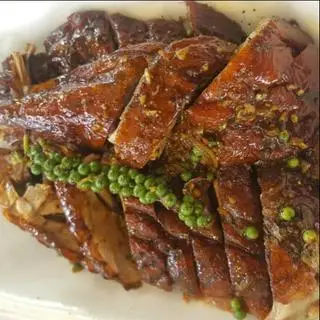 Hình ảnh Nguyên con vịt quay tiêu xanh - kèm xôi