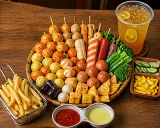 Hình ảnh Combo cá viên chiên thường lớn + món ăn kèm + trà tắc 