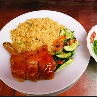 Hình ảnh Cơm rang đùi gà sốt chưa ngọt