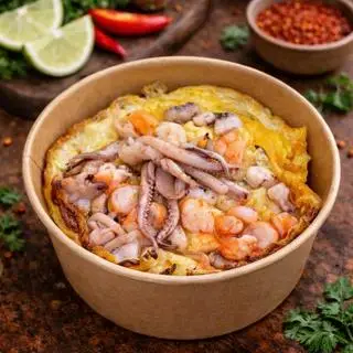 Hình ảnh Cơm hải sản phủ trứng 