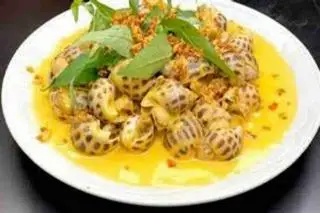 Hình ảnh Ốc hương sốt trứng muối 