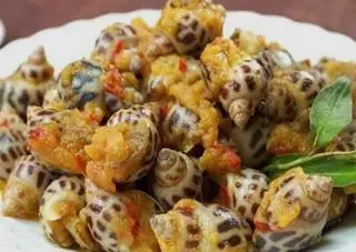Hình ảnh Ốc hương xào bơ tỏi