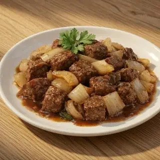 Hình ảnh Cơm bò lúc lắc xào hành tây