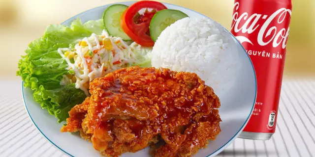 Hình ảnh Cơm gà cay ngọt + Mirinda