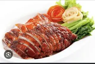 Hình ảnh Vịt quay mật ong sốt tiêu đen ( nữa con)