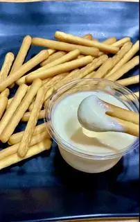 Hình ảnh Bánh que chấm kem