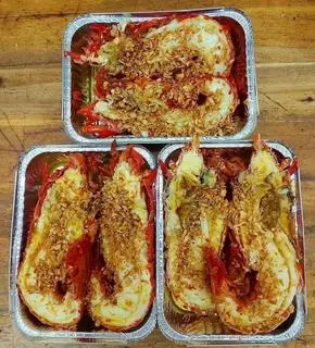 Hình ảnh tôm hùm bông 1 con 0,7 Lạng cháy tỏi 