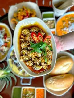 Hình ảnh Ốc Hương Xào Sốt Me