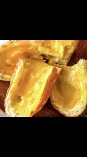 Hình ảnh ( 1 ổ ) Bánh mì nướng bơ mật ong