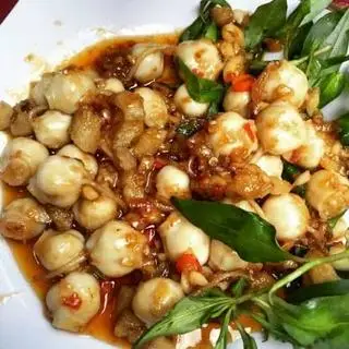 Hình ảnh răng mực xào bơ tỏi -bắp 