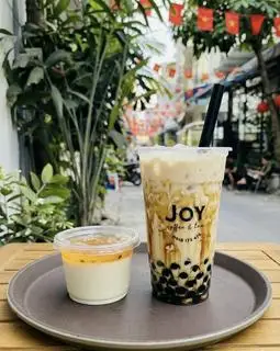 Hình ảnh Trà Sữa Tươi Trân Châu Đường Đen + Bánh Panna Cotta