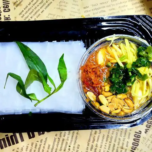 Hình ảnh Bánh tráng chấm sốt me