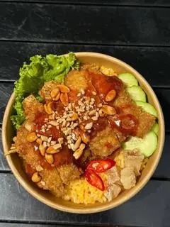 Hình ảnh Cơm đùi góc tư rút xương chiên giòn 