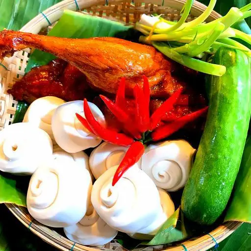 Hình ảnh Nửa con vịt quay  + 200gram heo quay(chặt miếng)