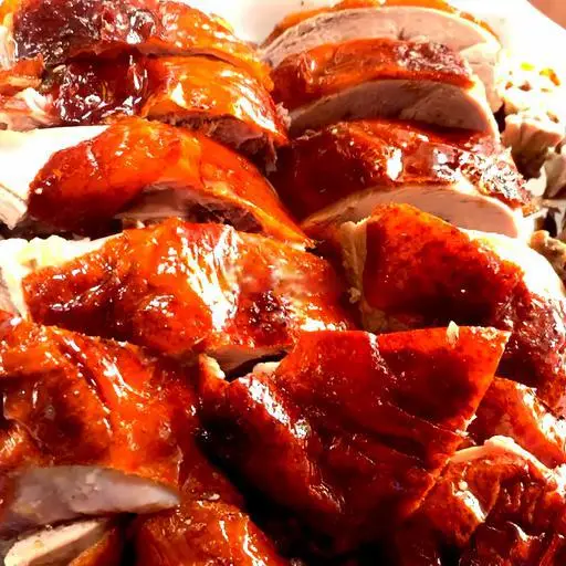 Hình ảnh Vịt quay nửa con + 150gr heo quay + 3bánh mì 