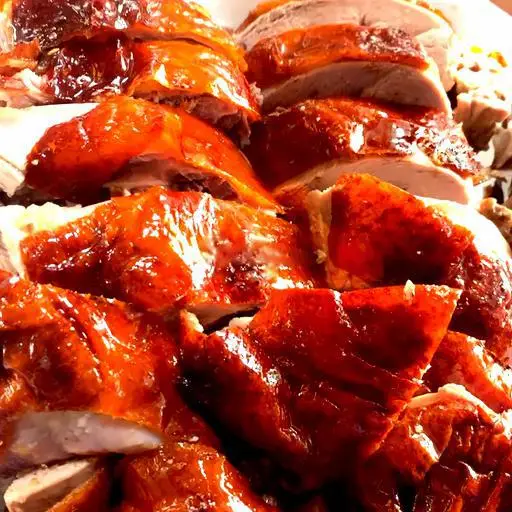 Hình ảnh Vịt quay mật ông ( để nguyên con không chặt)