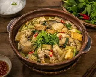 Hình ảnh Cá lăng om chuối đậu chuẩn vị bắc
