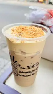 Hình ảnh trà sữa kem trứng dừa nướng full topping