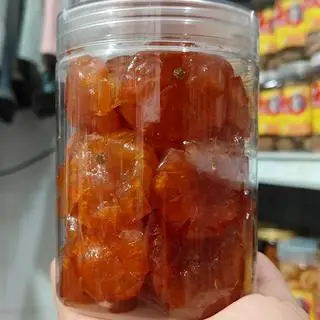 Hình ảnh mứt tắc hình hoa mai 