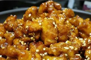 Hình ảnh Gà viên sốt bơ tỏi