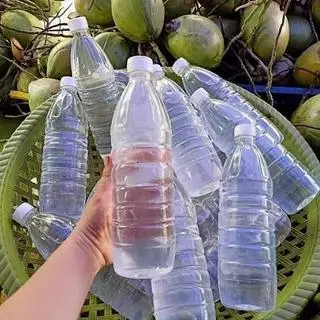 Hình ảnh DỪA TƯƠI NGUYÊN CHẤT ĐÓNG CHAI 1 LÍT 