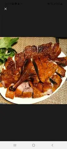 Hình ảnh Vịt nướng sa tế nguyên con cắt sẵn + Coca