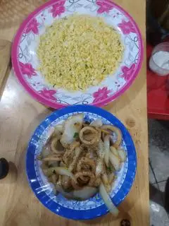 Hình ảnh cơm mực xào của hành 