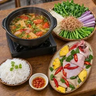 Hình ảnh Lẩu cá điêu hồng măng chua