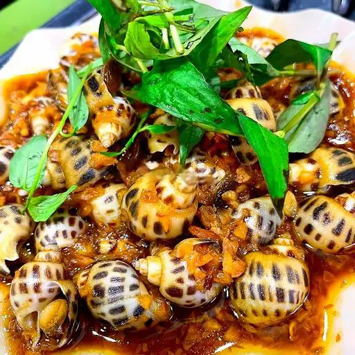 Hình ảnh Ốc hương xào me 