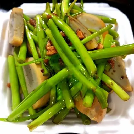 Hình ảnh Trứng gà nướng xào rau muống me