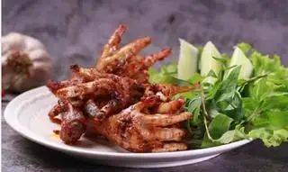 Hình ảnh chân gà nướng sa tế 22k/1 cặp