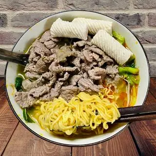 Hình ảnh Mì bò mực xoắn