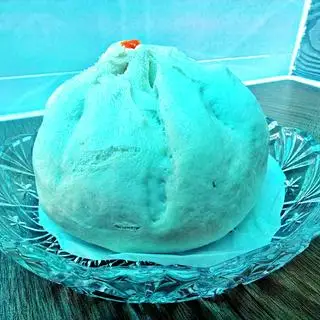 Hình ảnh Bánh bao nhân thịt, trứng muối và trứng cút 