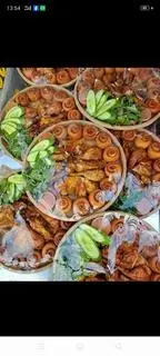 Hình ảnh COMBO Tiệc 2GÀ Nướng +10bánh bao ,rau rừng,rưa Leo,nước chấm 2loại 