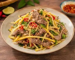 Hình ảnh Nộm bò xoài xanh chua cay