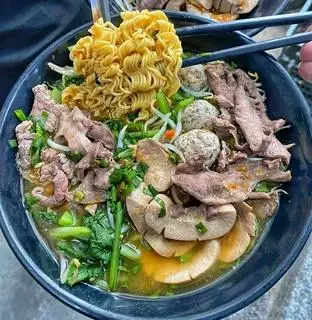 Hình ảnh Mì bò mọc tim chua cay