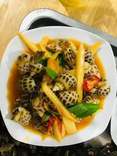 Hình ảnh ốc hương xào bơ cay