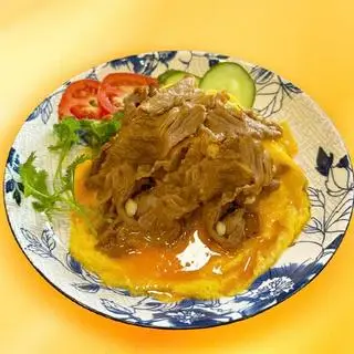 Hình ảnh Cơm phủ trứng BÒ.