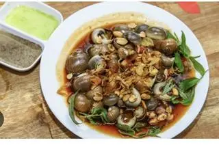 Hình ảnh Ốc mỡ xào me