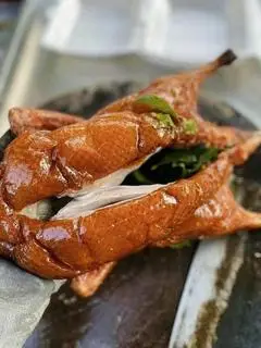 Hình ảnh vịt quay lá mắc mật 1 con 3kg - tặng 3 bánh bao