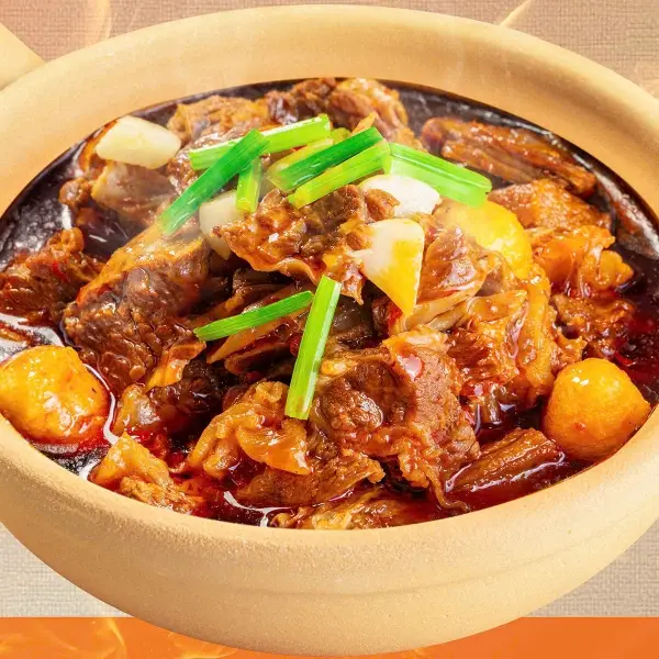 Hình ảnh Bò áp chảo mọng sốt - Juicy sizzling beef