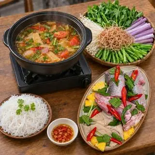 Hình ảnh Lẩu cá lóc măng chua