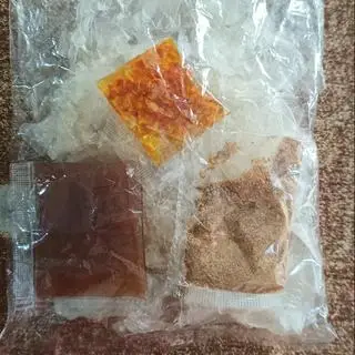 Hình ảnh bánh tránh dẻo sốt me cay